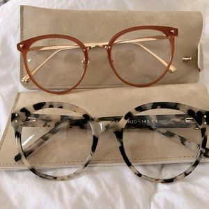 *2 non-prescription TJIN glasses with suede feel cases, have never been worn